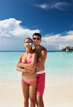 Couple on a tropical beach at Maldives