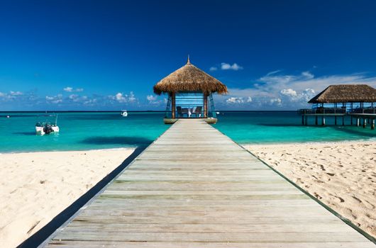 Beautiful beach with jetty at Maldives