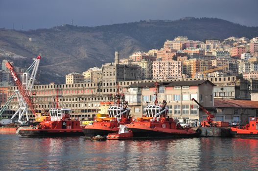 Cranes, boats, stock in Genoa.