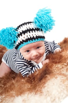 Shot of newborn baby lying on fur