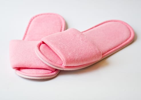 pink slipper on white background