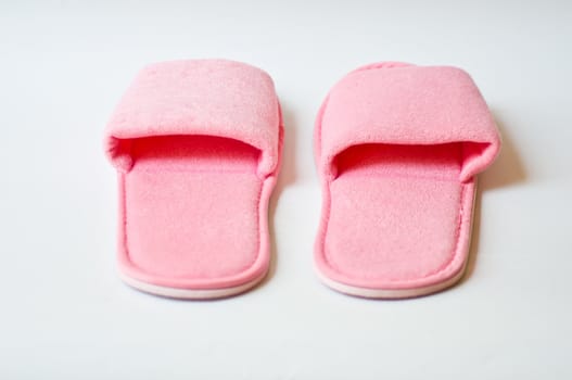 pink slipper on white background