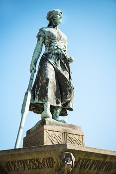 Fountain named "Tine" in Husum, Germany, on a sunny day in spring.