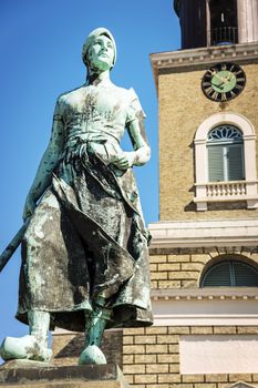 Well with the name "Tine" showing a fisherwoman, in the German town of Husum