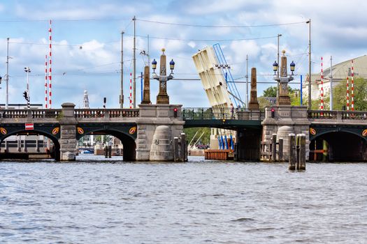 Ornate bridge on Amsterdam Canal, The Netherlands.