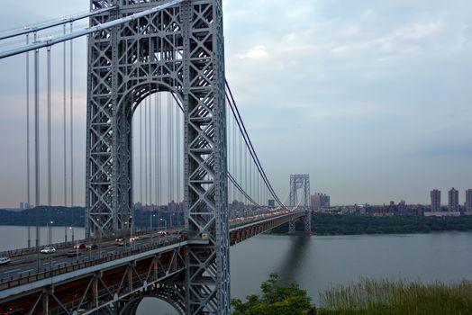 A wide view of the george washington bridge between new jersey and new york city.
