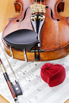 Old violin with notes