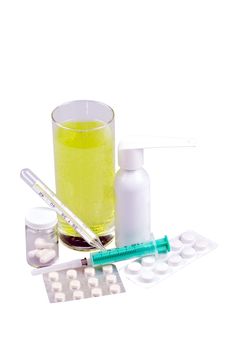 Medical supplies, tablets and capsules, spray throat and drink. Isolated on white background.
