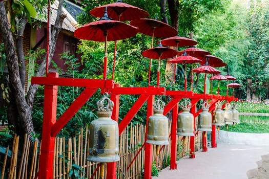 Row of bells at buddhist temple in chiang mai, thailand