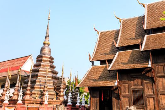 Bronz stupa in puntao temple, the very old wooden temple in chiang mai, thailand