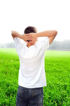 happy teenager in the summer field