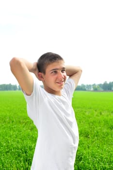 happy teenager in the summer field