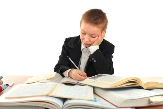 schoolboy sitting in the classroom