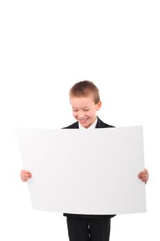 cheerful schoolboy hold blank signpost isolated on the white