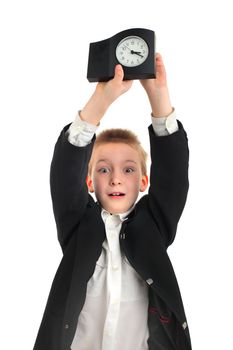 surprised schoolboy with a clock on the white background