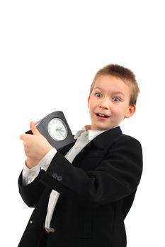 surprised schoolboy with a clock on the white background