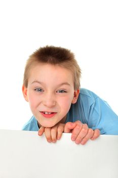 cheerful boy face with blank paper closeup isolated on the white