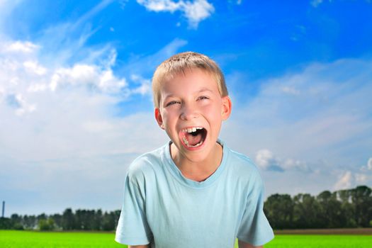 portrait of screaming boy outdoor