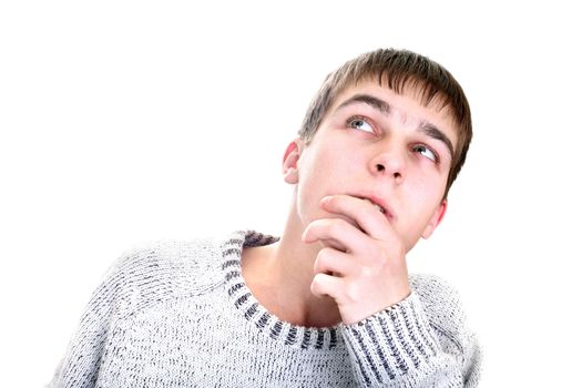 young man is thinking isolated on the white