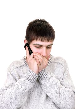 young man secretly talking on mobile phone on the white background