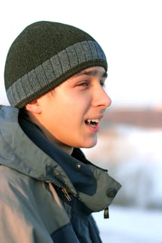 cheerful teenager in the winter outdoor