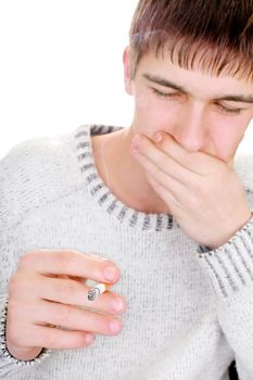 young man hates smoking. on the white background