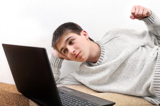 young man threaten a fist for notebook