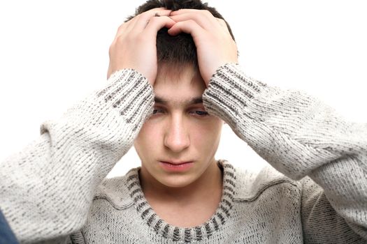 sad young man portrait isolated on the white