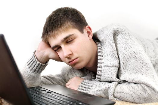 bored teenager with notebook getting sleeping