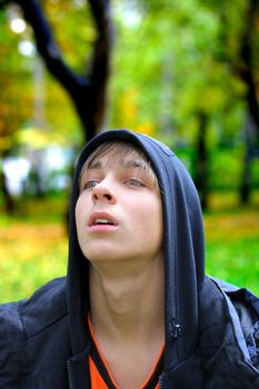 teenager dreaming in the autumn park