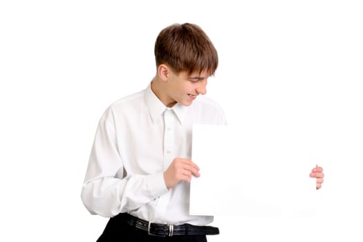 teenager holding blank paper isolated on the white background