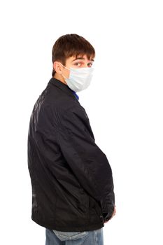 teenager in the flu mask isolated on white background