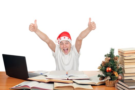 happy student in santa's hat with hands up. isolated on the white background