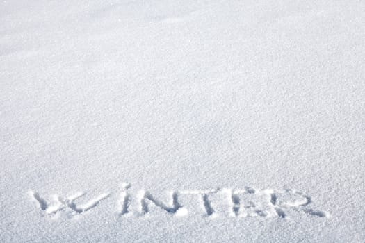 Handwritten Inscription "Winter" on the Snow