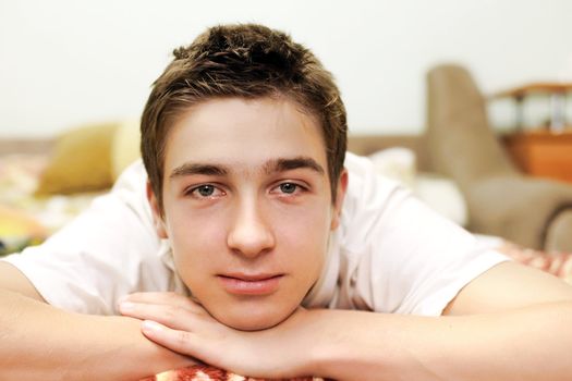 Young Man Portrait in the Bed closeup