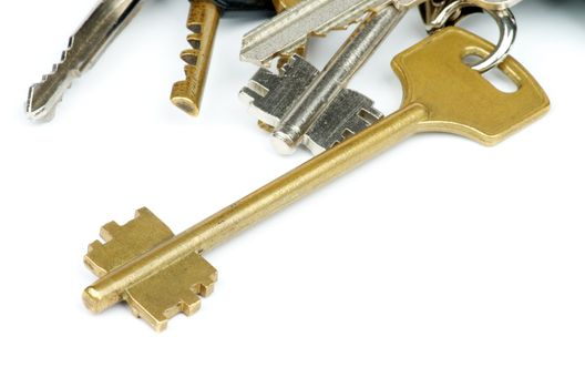 Heap of Various House Keys isolated on white background