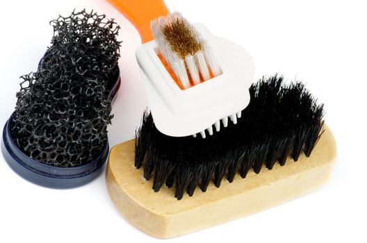 Various Shoes and Clothes Cleaning Brushes isolated on white background