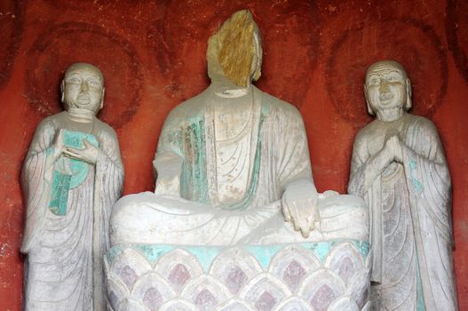 Ancient buddha statue in caves in Sichuan, China