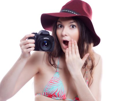 smiling woman with a professional camera isiolated