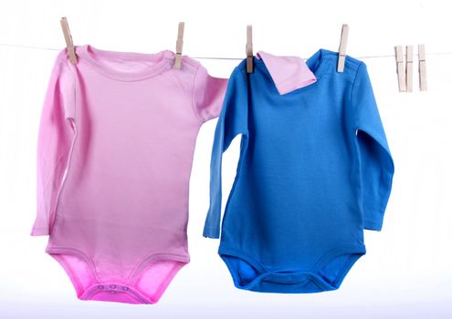 Baby clothes on a clothesline