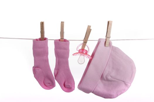 Baby clothes on a clothesline