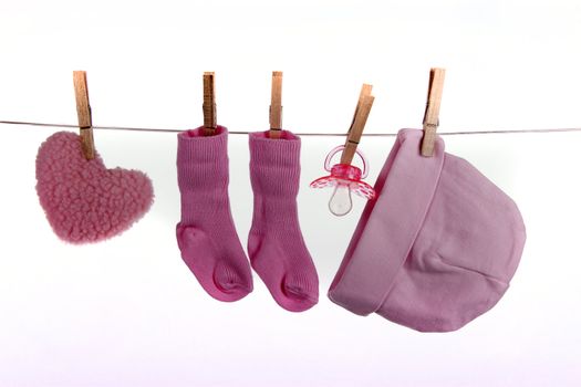 Baby clothes on a clothesline