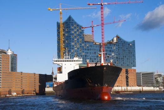 Ship and the Elbe Philharmonic Hall (Elbphilharmonie) in Hamburg