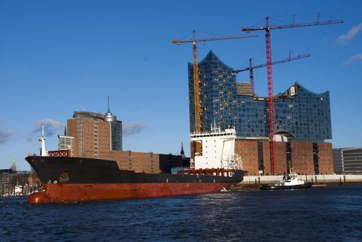 Ship and the Elbe Philharmonic Hall (Elbphilharmonie) in Hamburg