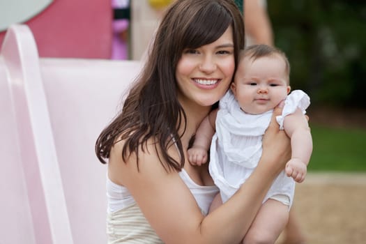 Close-up portrait of happy mother with her adorable daughter