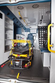 Detail of an empty ambulance interior with stretcher