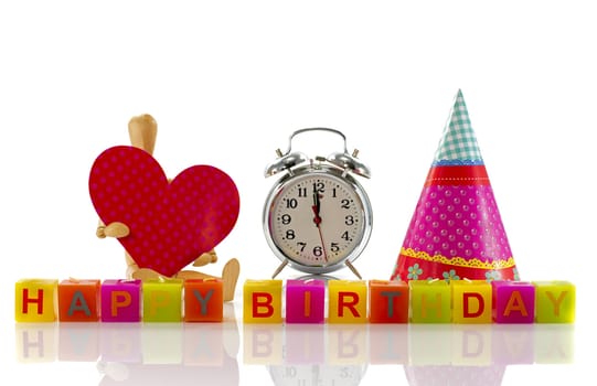 happy bithday candles with red heart hat en clock