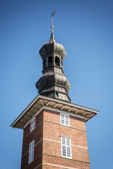 Tower of the castle in Husum with blue sky on a sunny day in spring