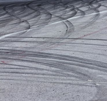 Background with tire marks on road track
