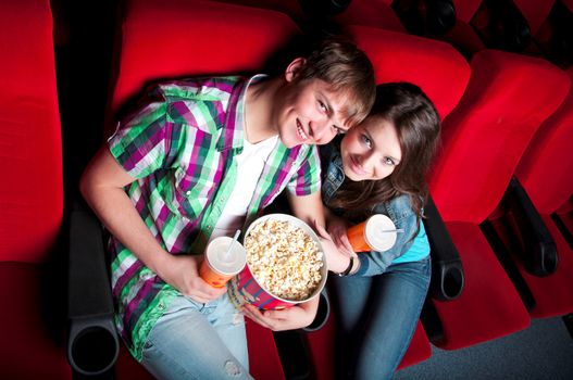 couple in a movie theater, watching a 3D movie